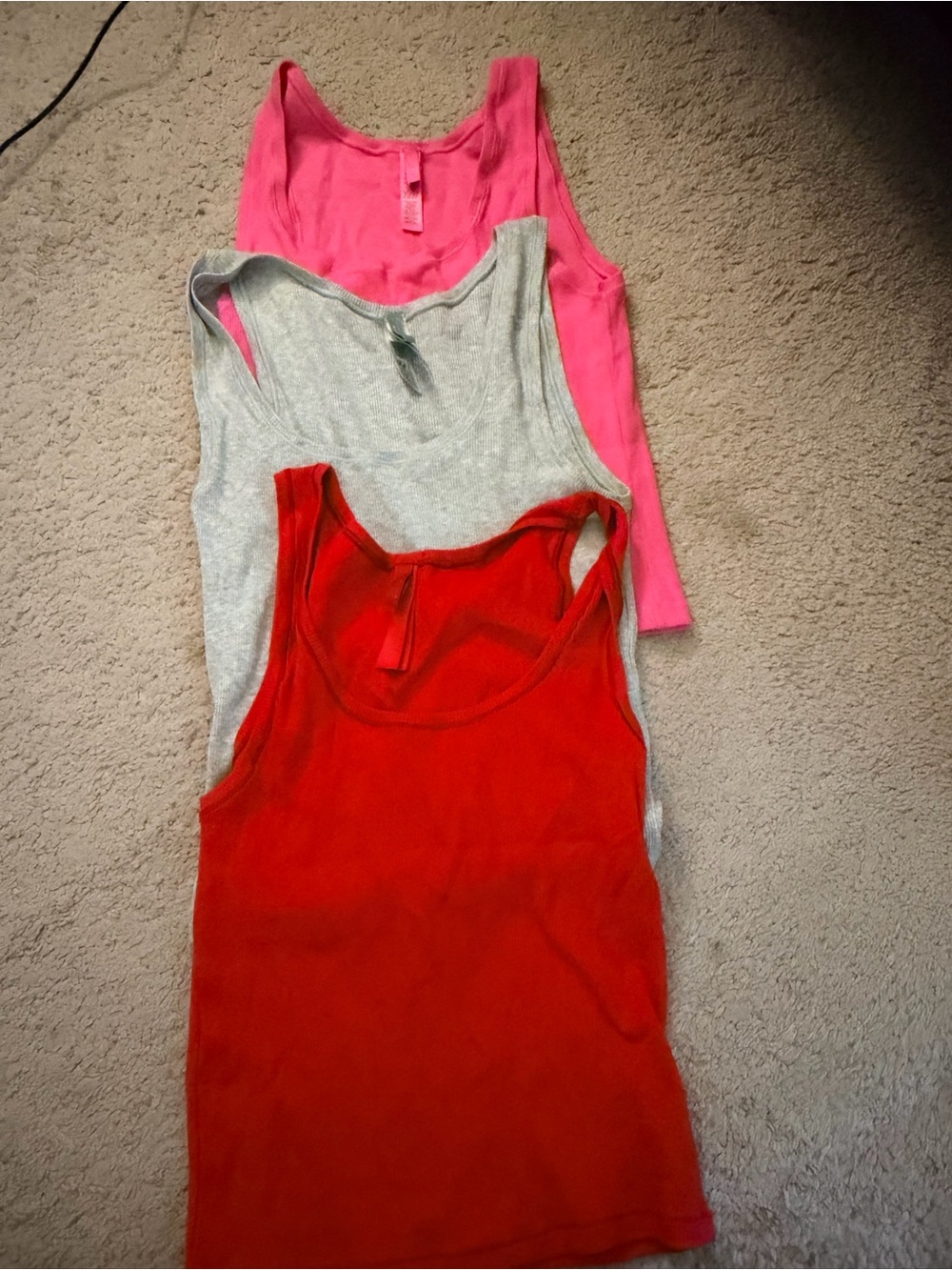 SKIMS Tank Tops in Red, Gray & Pink